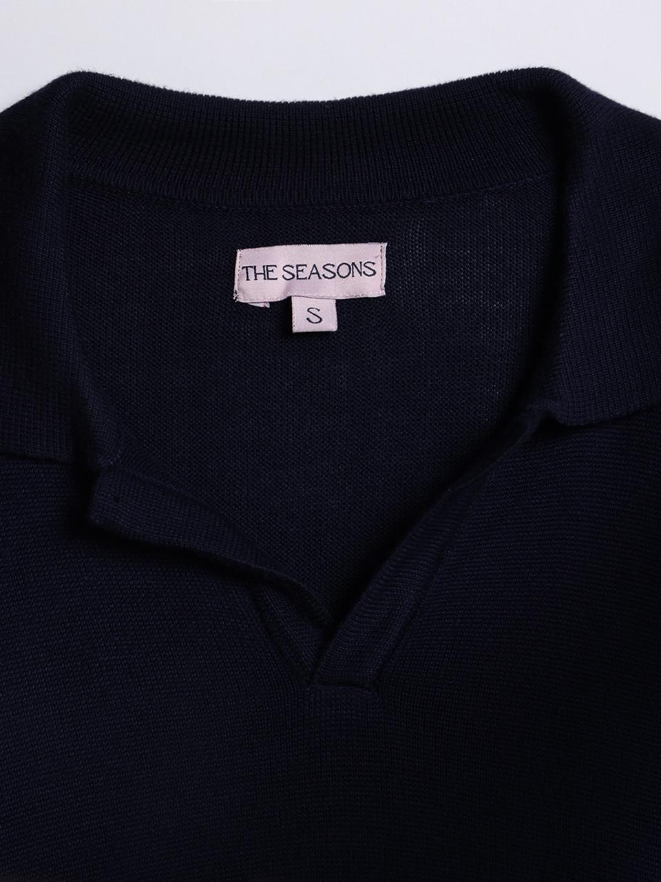 Close-up of Heavy Midnight Blue Polo – Fine Piqué Texture and Buttonless Collar from The Seasons