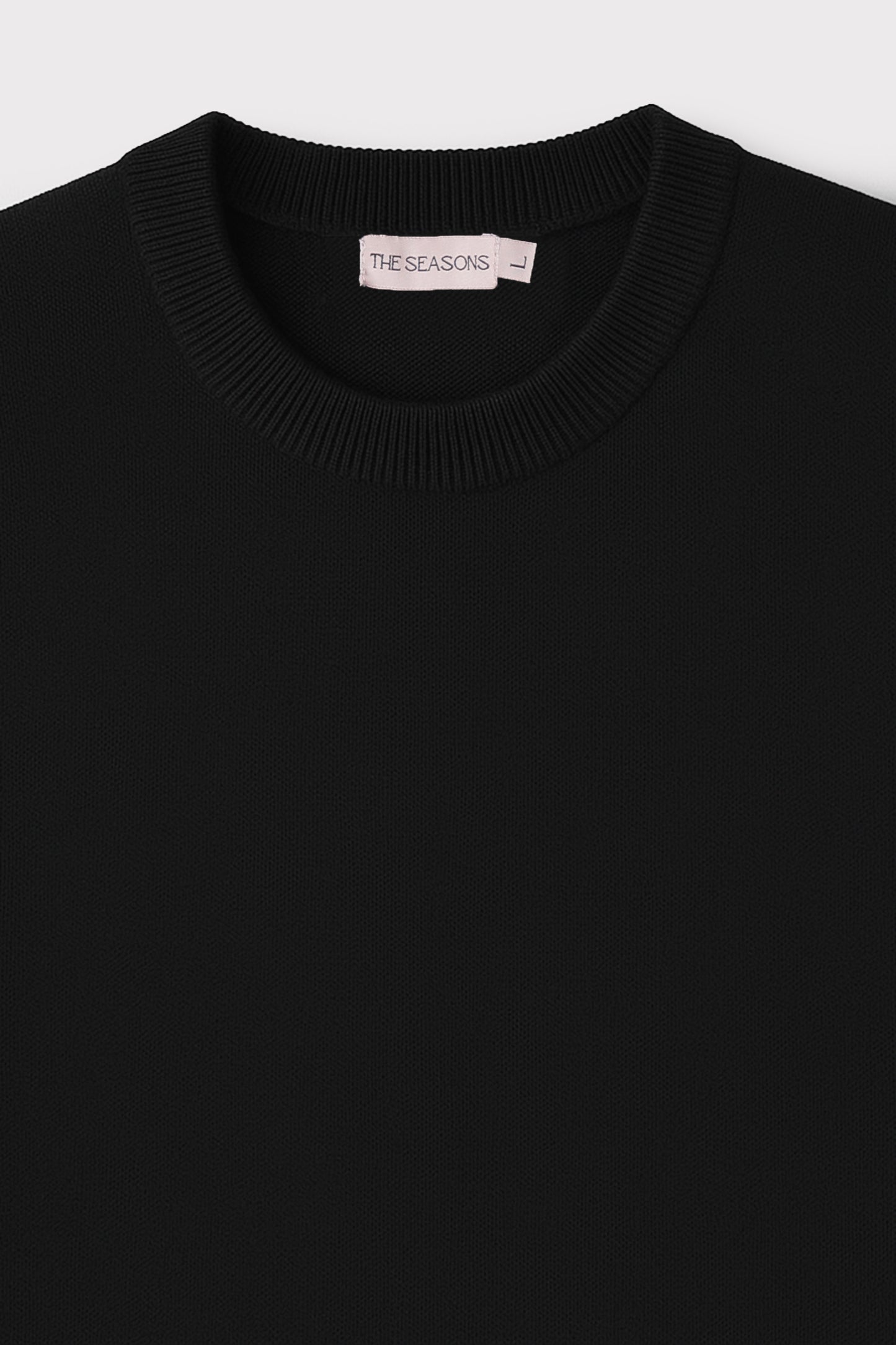 Onyx Crewneck Mockup Closeup from The Seasons