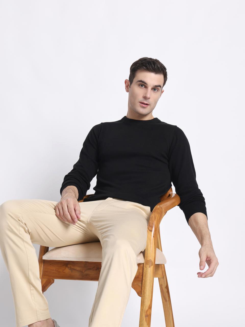 Noir black crewneck with a sleek, minimal design, crafted for comfort and effortless style.